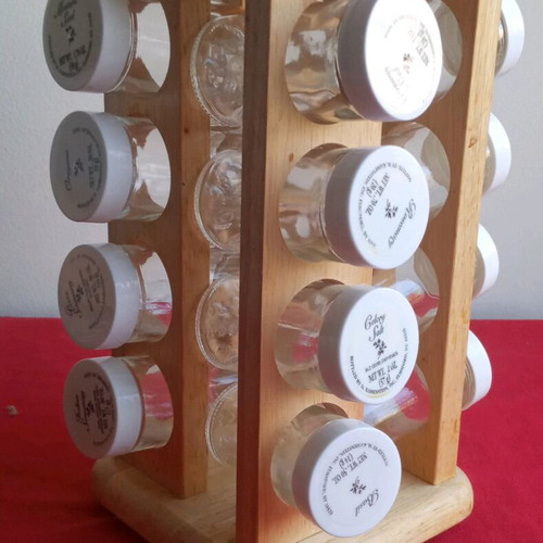 Spice jars used in wooden rotating rack with 16 glass containers