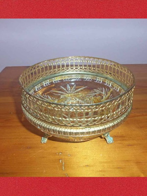 Tabletop metal fondue pot used with intricate decoration