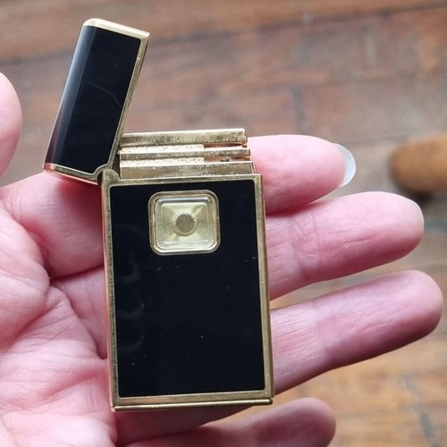 Colibri Touch Sensor Lighter used, black and gold