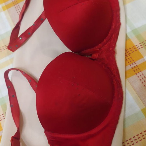 Bra used red with straps decorated with rhinestones