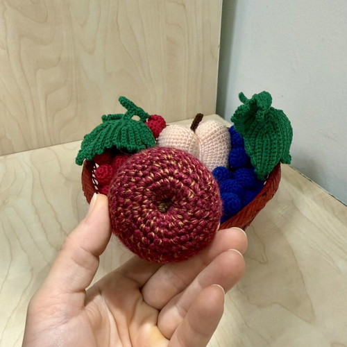 Basket with handmade fruit decoration