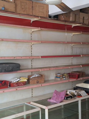 Professional shelving used with display cabinets