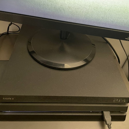 PlayStation 4 Pro 500GB console with 15 games used