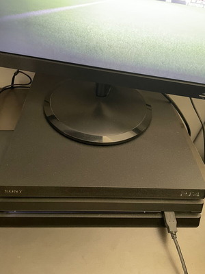 PlayStation 4 Pro 500GB console with 15 games used