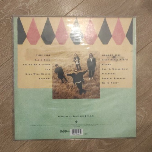REM Out of Time vinyl record used with sleeve
