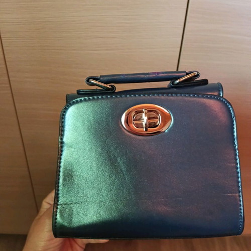 Axel blue wrist bag like new with minor wear