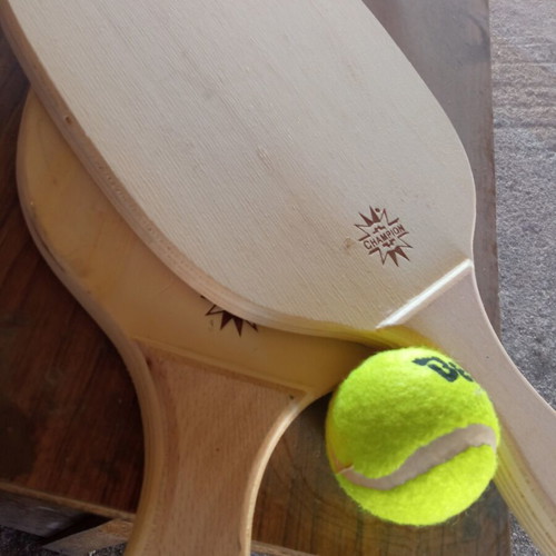 Wooden rackets with ball used, minor imperfections