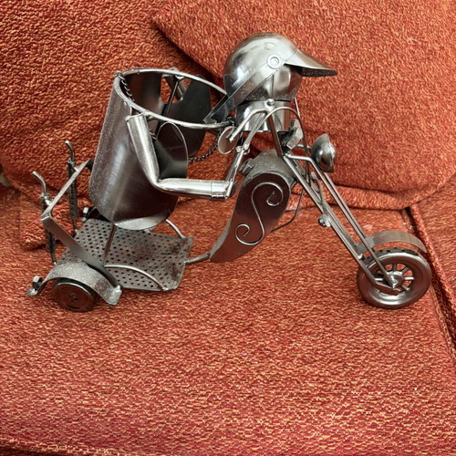 Metal decorative bottle holder in tricycle shape like new