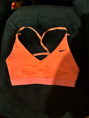 Nike sports bra size S used, pink orange, low support