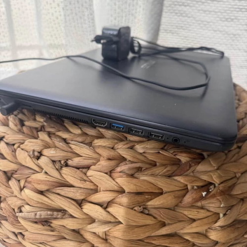 Asus laptop used, Intel Celeron, 8GB RAM, Windows 10