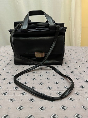 Crossbody bag used, very practical with many compartments