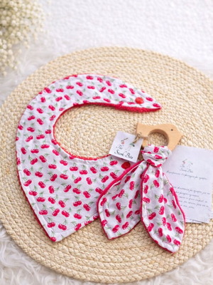 Handmade baby gift set with bib and fabric teether