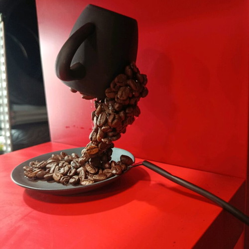 Handmade table lamp with porcelain, coffee beans, and 12 LED lights