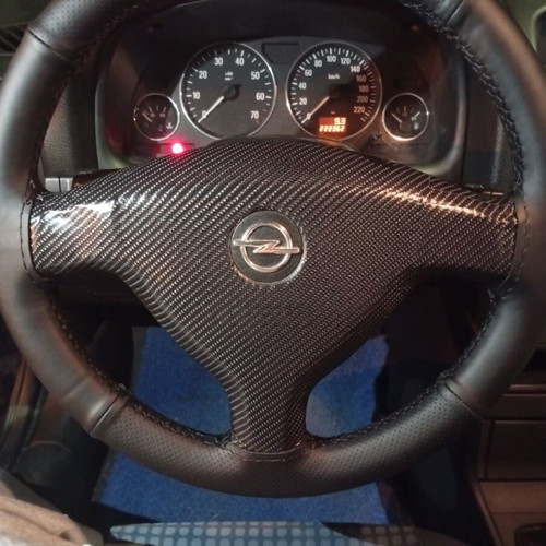 Hand-stitched steering wheel cover with installation