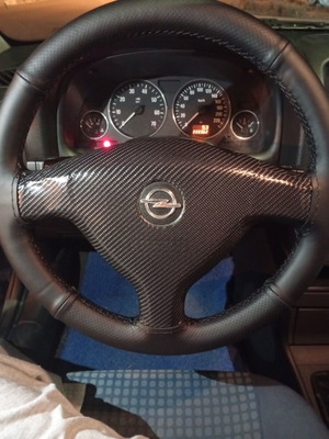 Hand-stitched steering wheel cover with installation