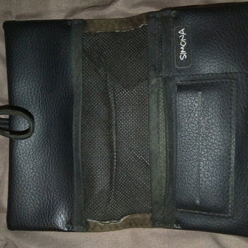 Smoking case used with compartments for filters, rolling papers, and lighter