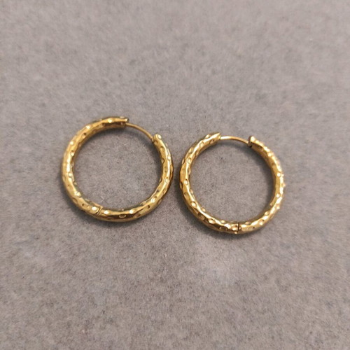 Steel earrings in gold color like new
