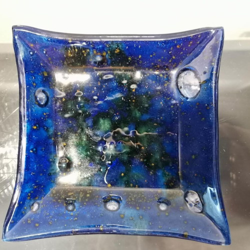 Decorative plate used, blown glass blue with green and yellow elements
