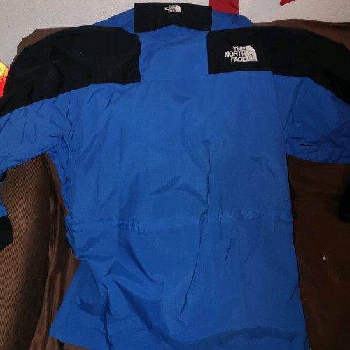 The North Face men's jacket used blue and black waterproof windbreaker