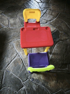 Children's table with two plastic chairs used