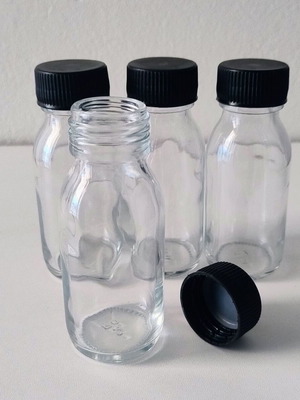 Set of 4 glass bottles 50ml with black screw plastic cap
