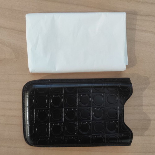 Vintage Salvatore Ferragamo phone case like new, black leather
