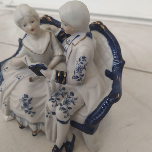Vintage couple figurine reading on sofa rococo style like new