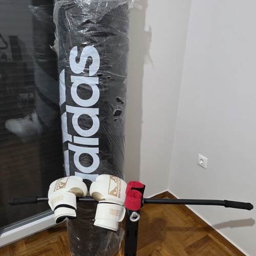 Adidas boxing set new with punching bag, gloves, spring, and wall mount