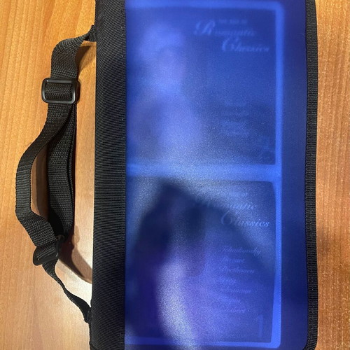 Collection of 64 CDs with carrying case, classical jazz entechno