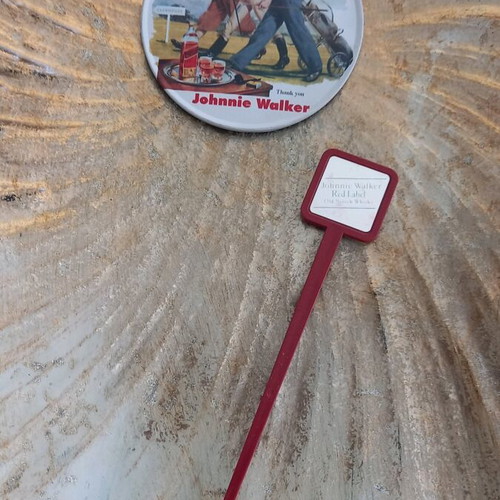 Johnnie Walker collectible set like new with 5 coasters and stirrer