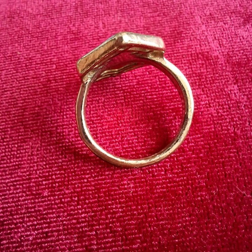 Hexagon ring used, gold color