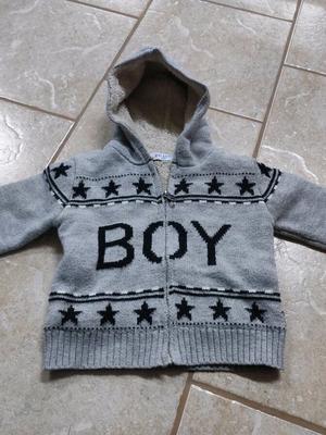 Knitted cardigan with fur lining like new