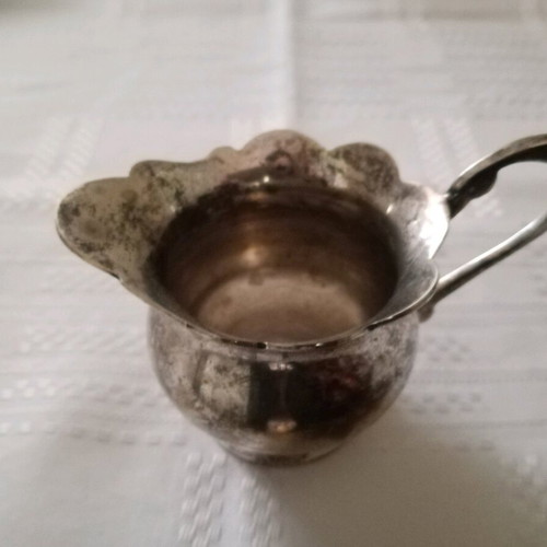 Silver-plated vintage Granny's milk jug used