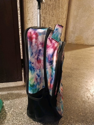 School trolley bag used with functional zippers and wheels