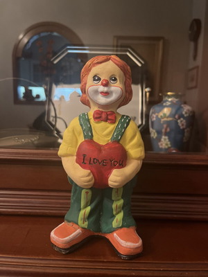 Vintage decorative clown with heart used