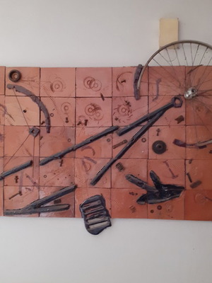 Painting with handmade tile used