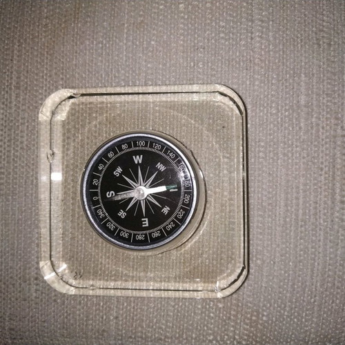 Compass used with small dents on the bottom