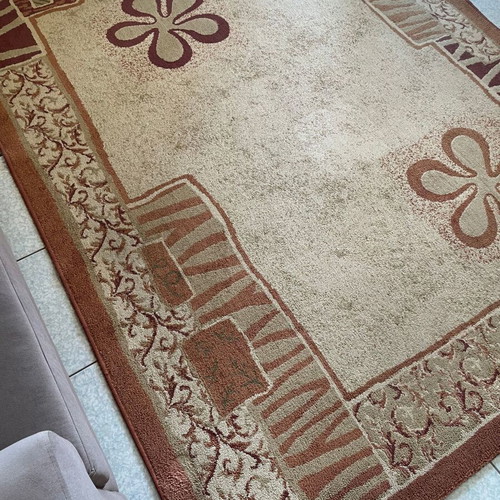 Brown living room rug used, 240cm x 210cm