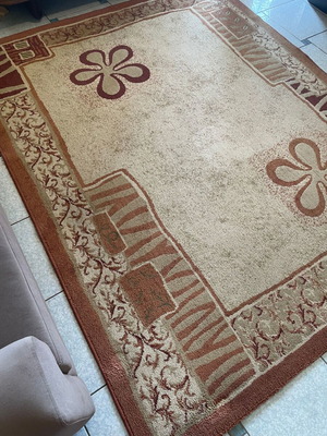 Brown living room rug used, 240cm x 210cm