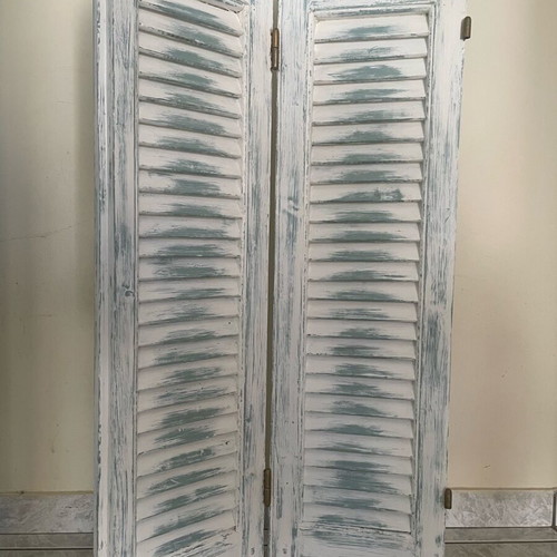 Decorative wooden shutter refurbished with chalk paint colors