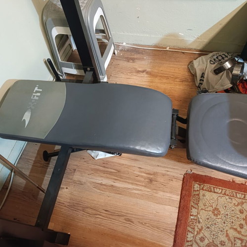 Weight bench with bar and weights used, iron