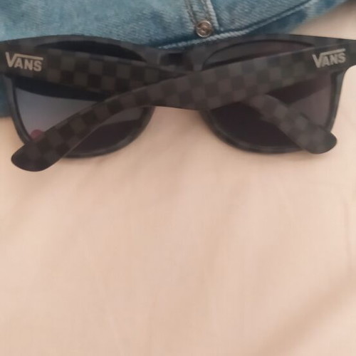 Vans sunglasses used with scratched lenses and slightly loose arms