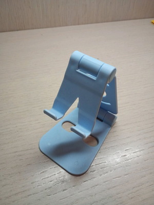 Foldable phone stand like new, blue