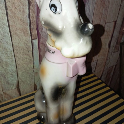 Vintage porcelain bottle shaped like a dog 26"
