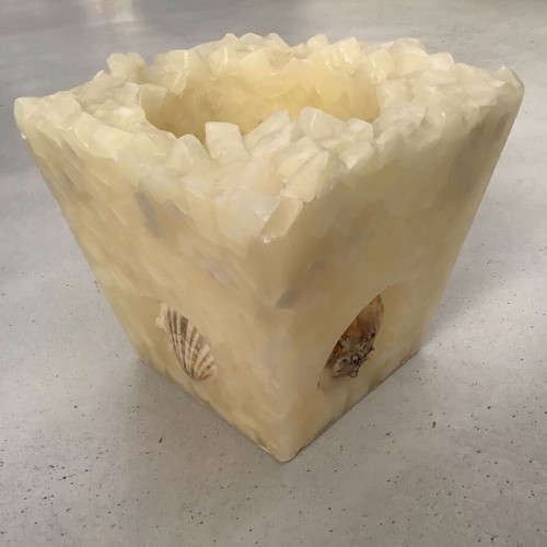 Handmade decorative candle holder used, cream color wax