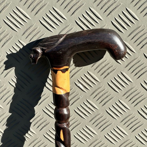 Handmade wooden walking stick used with lion head and spiral decoration