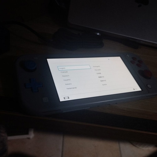 Nintendo Switch Lite console with Digimon Survive game