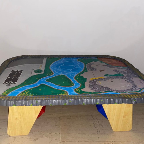 Children's play table with train track used
