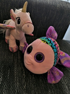 Plush unicorn and glitter fish set used