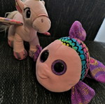 Plush unicorn and glitter fish set used